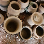 images of a group of frshly made pots from above